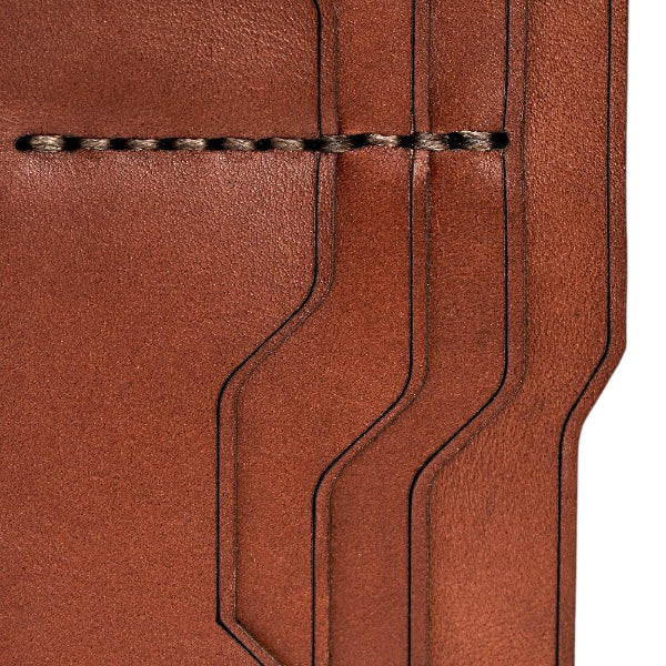 Handmade light mahogany leather card holder, close-up of leather texture and stitching