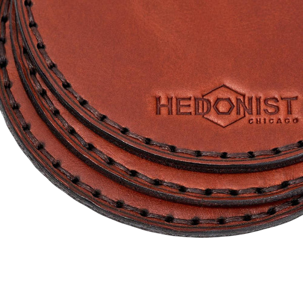 Hedonist Chicago leather coasters in Light Mahogany Mahogany, clean edge, full grain leather, angled view
