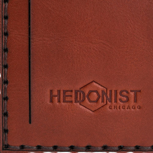 Hedonist Chicago light mahogany luggage tag in light mahogany, with strap, full grain leather, flat lay view