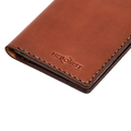 Hedonist Chicago light mahogany passport case in light mahogany, travel cover, full grain leather, close view