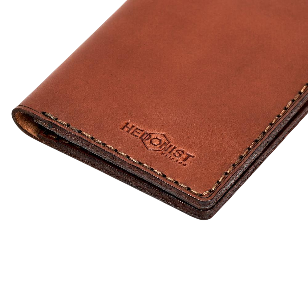 Hedonist Chicago light mahogany passport case in light mahogany, travel cover, full grain leather, close view