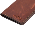 Handmade light mahogany pull-up leather card holder, styled angled view