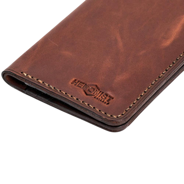 Handmade light mahogany pull-up leather card holder, styled angled view