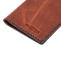 Hedonist Chicago light mahogany passport case in light mahogany, travel cover, full grain leather, close view