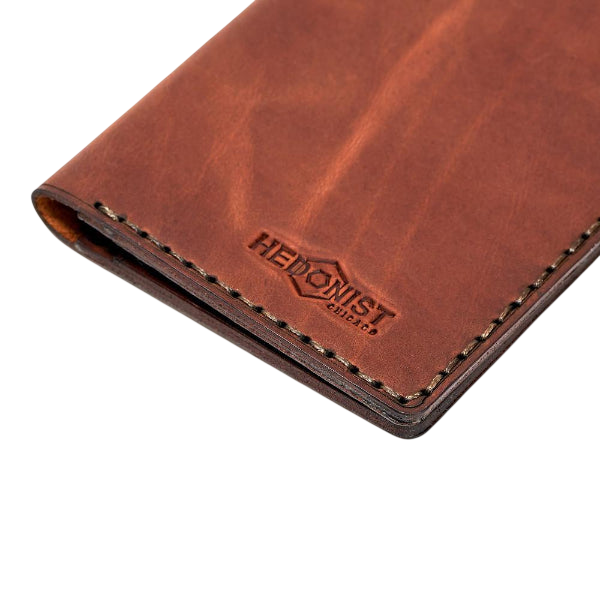Hedonist Chicago light mahogany passport case in light mahogany, travel cover, full grain leather, close view