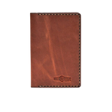 Hedonist Chicago light mahogany passport case in light mahogany, travel cover, full grain leather, product view