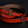 Side view on women's seamless edge leather belt - orange-red - Hedonist Chicago - close-up view (1.3")