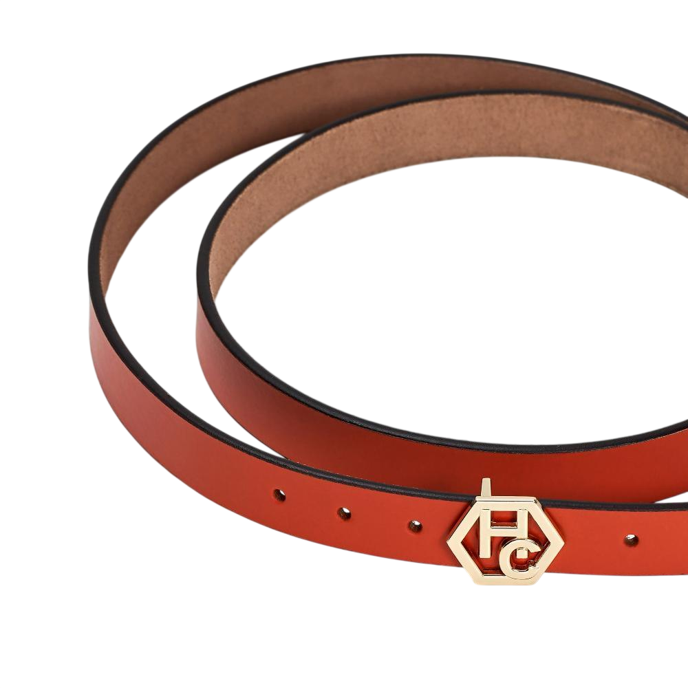 Buckle close-up on women's seamless edge leather belt - orange-red - Hedonist Chicago - close-up view (1")