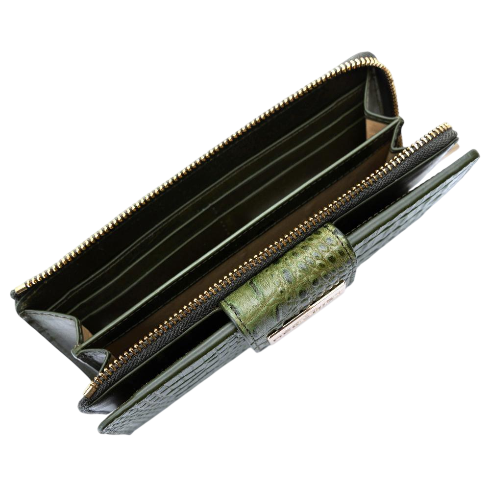 Top view of green leather long women’s travel wallet interior with multiple slots and zip compartments