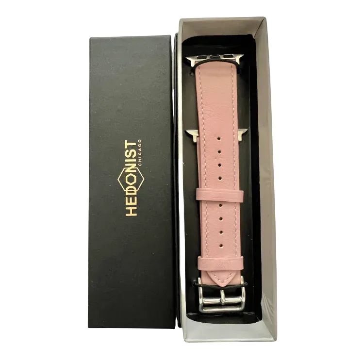 Pink leather Apple Watch band, presented in gift box