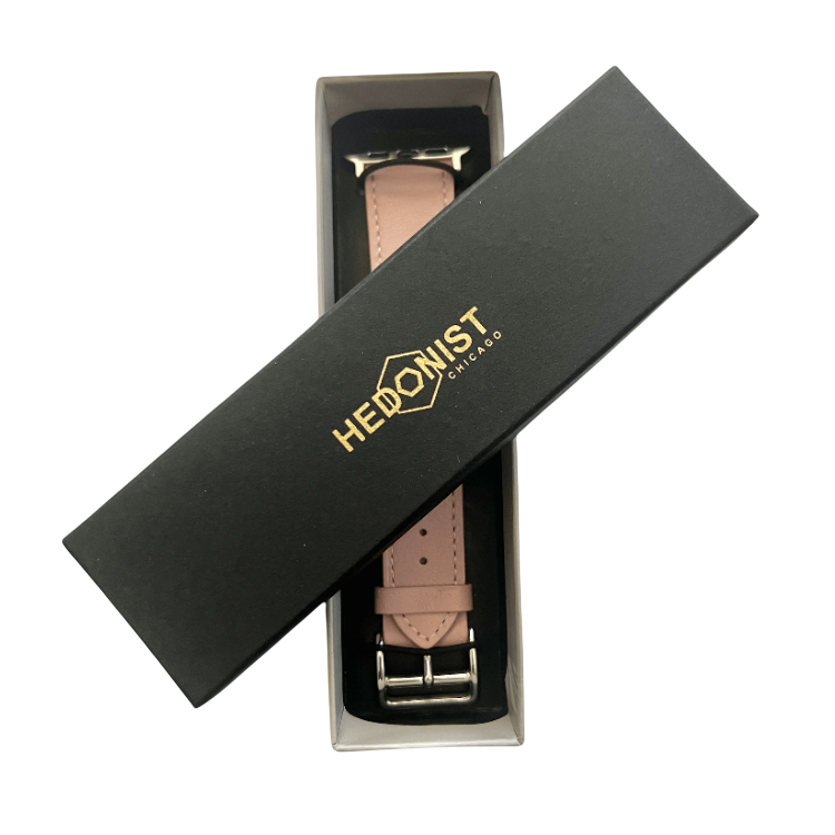 Pink leather Apple Watch band, packaging close-up