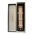 Pink beige padded leather Apple Watch band, packaging close-up