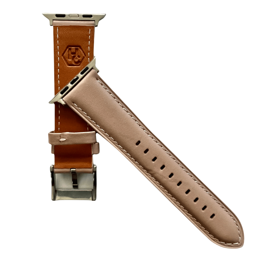 Pink beige padded leather Apple Watch band, side view with stainless steel lugs