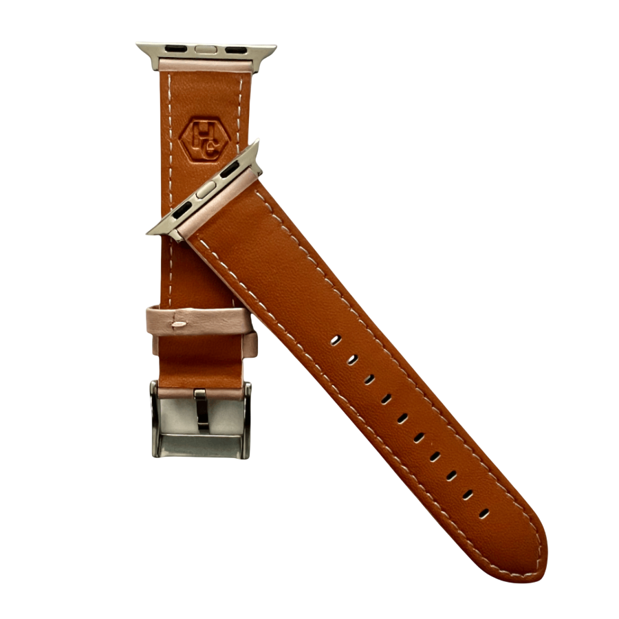 Pink beige padded leather Apple Watch band, texture and buckle detail close-up