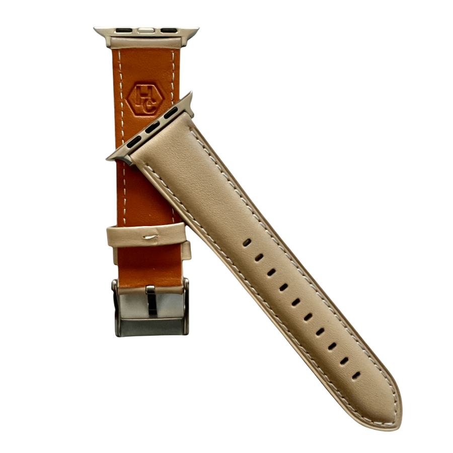 Pink gray padded leather Apple Watch band, texture and buckle detail close-up