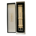 Pink grey leather watch band with quick release bars, texture close-up