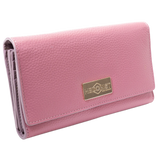 Pink leather trifold wallet for women closed, gold-tone Hedonist Chicago plaque on front