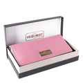 Pink leather trifold wallet presented in Hedonist Chicago branded gift box