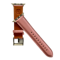 Pink padded leather Apple Watch band, texture and buckle detail close-up