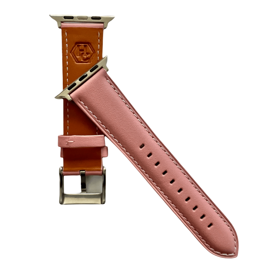 Pink padded leather Apple Watch band, texture and buckle detail close-up