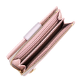 Pink pebbled leather travel wallet open showing zip-around perimeter and interior compartments