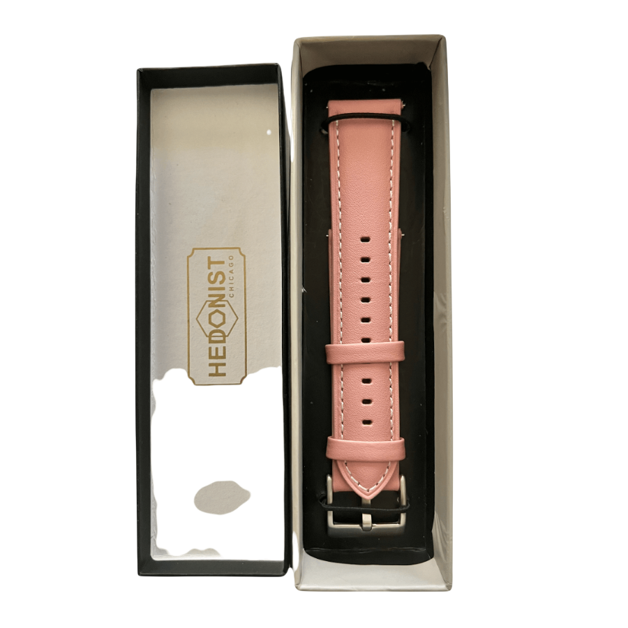 Pink leather watch band with quick release bars, texture close-up