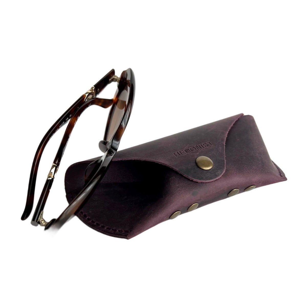 Soft Leather Eye Glasses Case in Plum with tortoiseshell sunglasses beside it