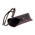 Soft Leather Eye Glasses Case in Plum with tortoiseshell sunglasses beside it