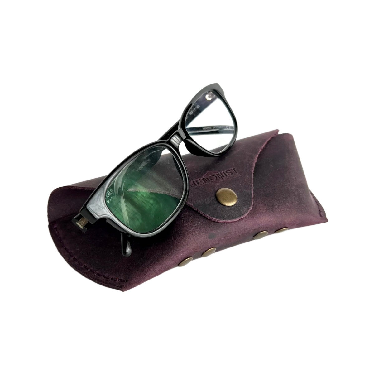 Soft Leather Eye Glasses Case in Plum with tinted-lens eyeglasses resting on top