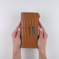 Hedonist Chicago tan passport case in tan, travel cover, full grain leather, angled view
