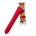Red leather Apple Watch band, texture and buckle detail close-up