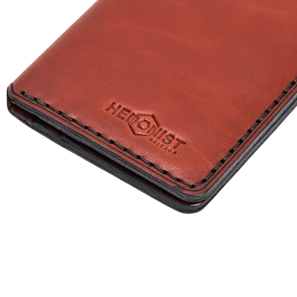 Handmade red brick leather card holder, 8 card slots fanned out view