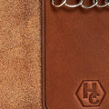 Hedonist Chicago brick key holder in brick, slim profile, full grain leather, flat lay view