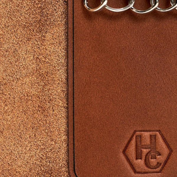 Hedonist Chicago brick key holder in brick, slim profile, full grain leather, flat lay view