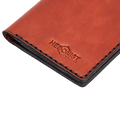 Hedonist Chicago brick passport case in brick, travel cover, full grain leather, close view