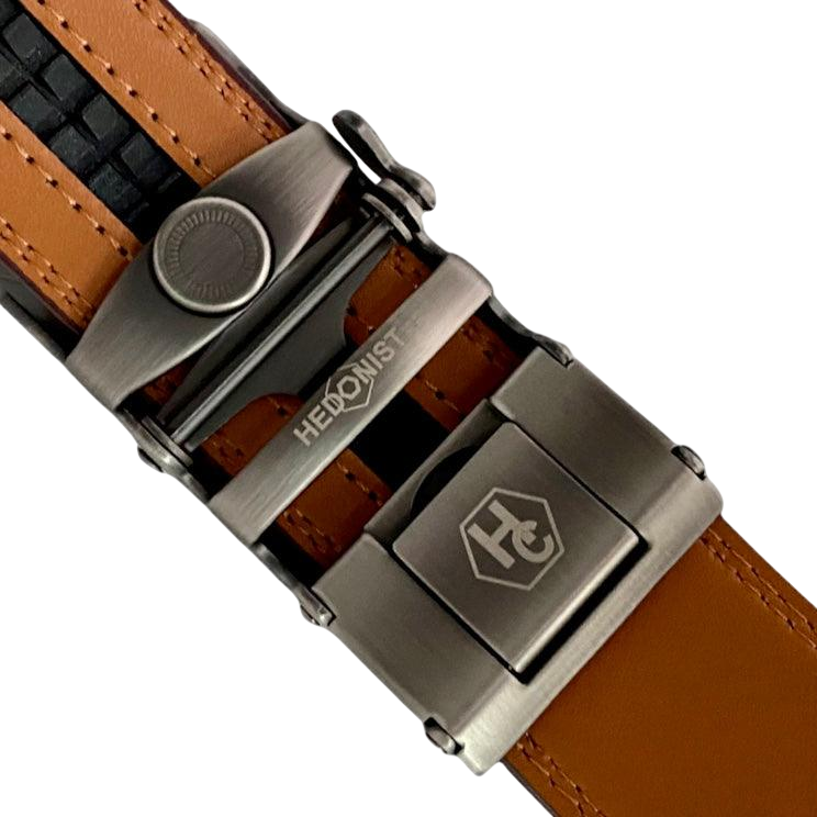 Red-brown leather ratchet belt with metal frame buckle, hardware close-up