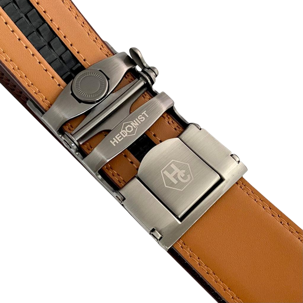 Red-brown leather ratchet belt with gunmetal rectangle buckle, hardware close-up