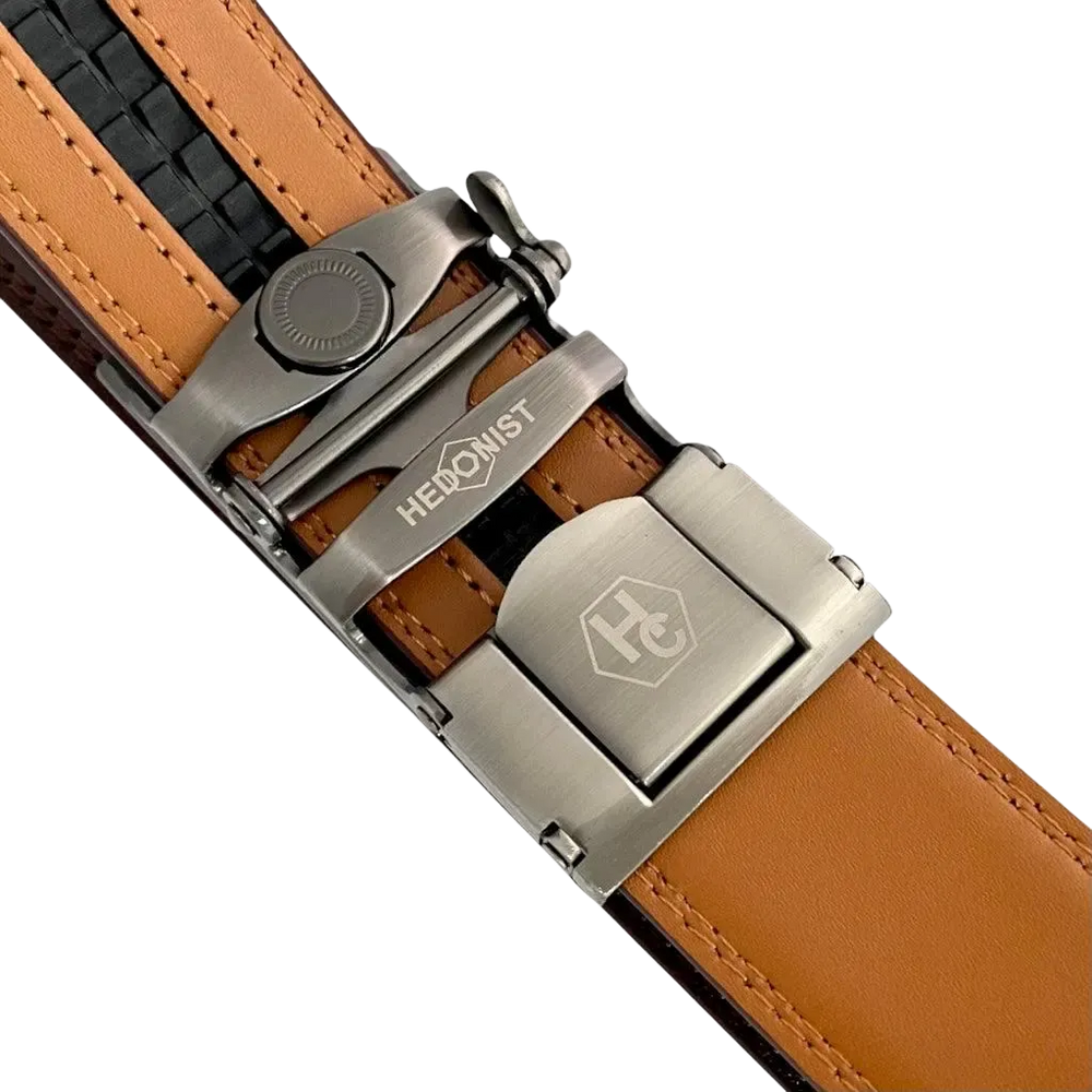 Red-brown leather ratchet belt with gunmetal rectangle buckle, hardware close-up