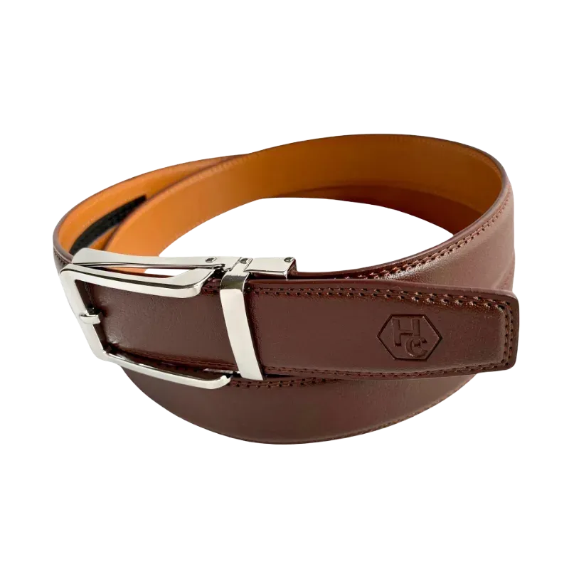 Red-brown leather ratchet belt with silver hollow buckle, buckle detail close-up