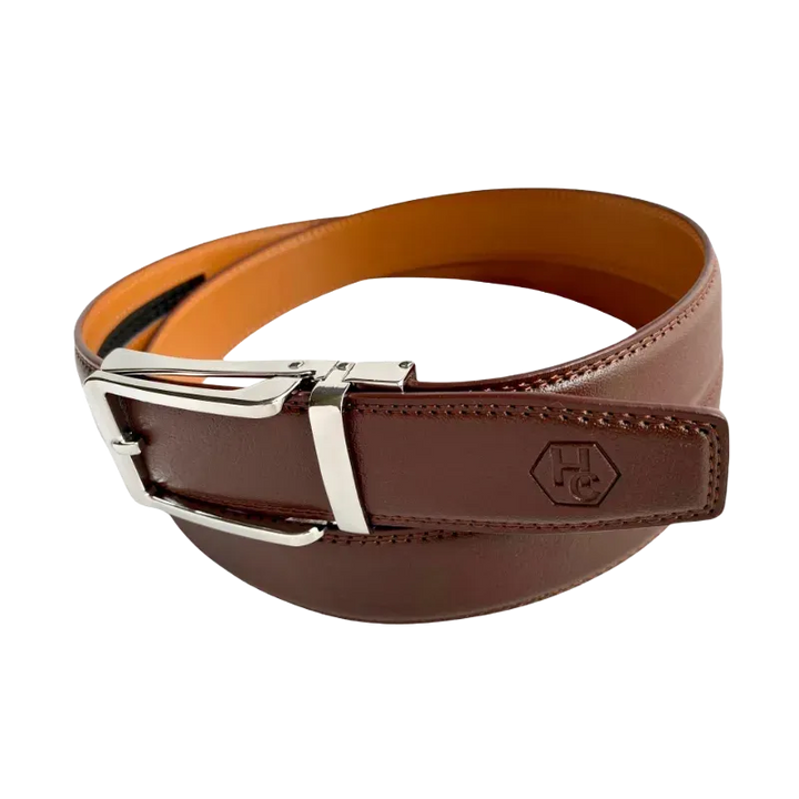 Red-brown leather ratchet belt with silver hollow buckle, buckle detail close-up