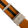 Red-brown leather ratchet belt with silver hollow buckle, hardware close-up