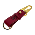 Red and gold leather key chain, full grain leather, angled view