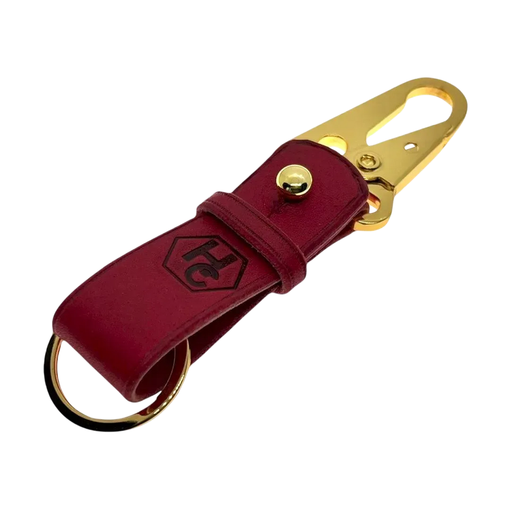 Red and gold leather key chain, full grain leather, angled view