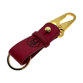 Red and gold leather key chain, full grain leather, angled view