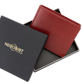 A red leather bi-fold wallet displayed in an open black presentation box with a matching branded lid. The lid shows the gold-toned HEDONIST CHICAGO logo.
