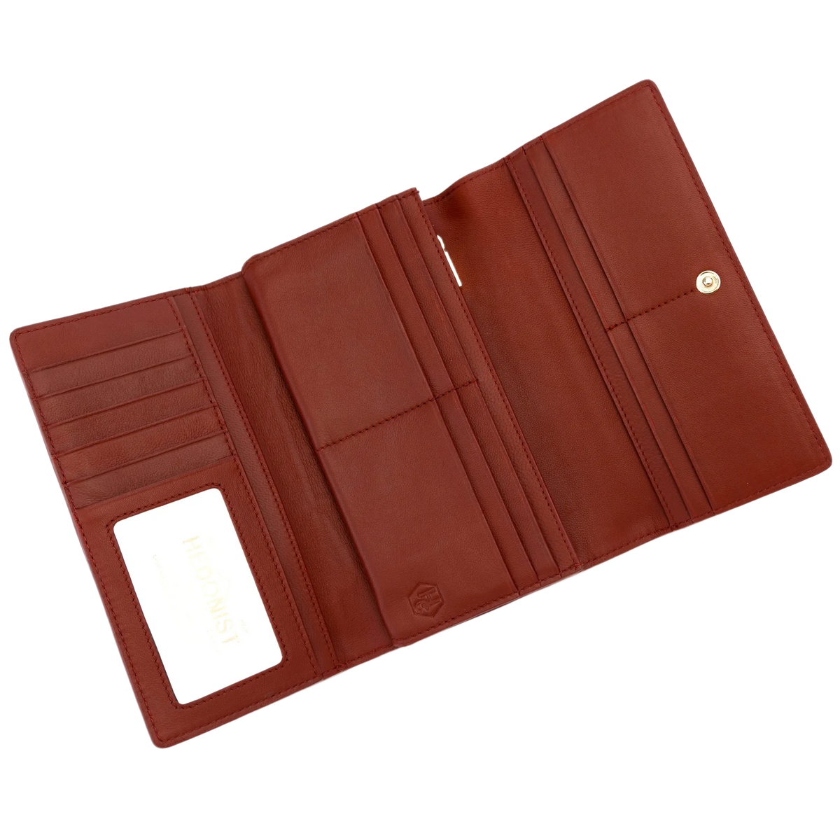 Red pebbled leather trifold wallet open showing card slots, ID window, and snap closure