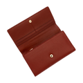 Close-up of the gold-tone snap closure on red pebbled leather trifold wallet