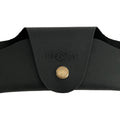 Small Soft Leather Eye Glasses Case in Black, closed, front view with embossed Hedonist logo and snap closure