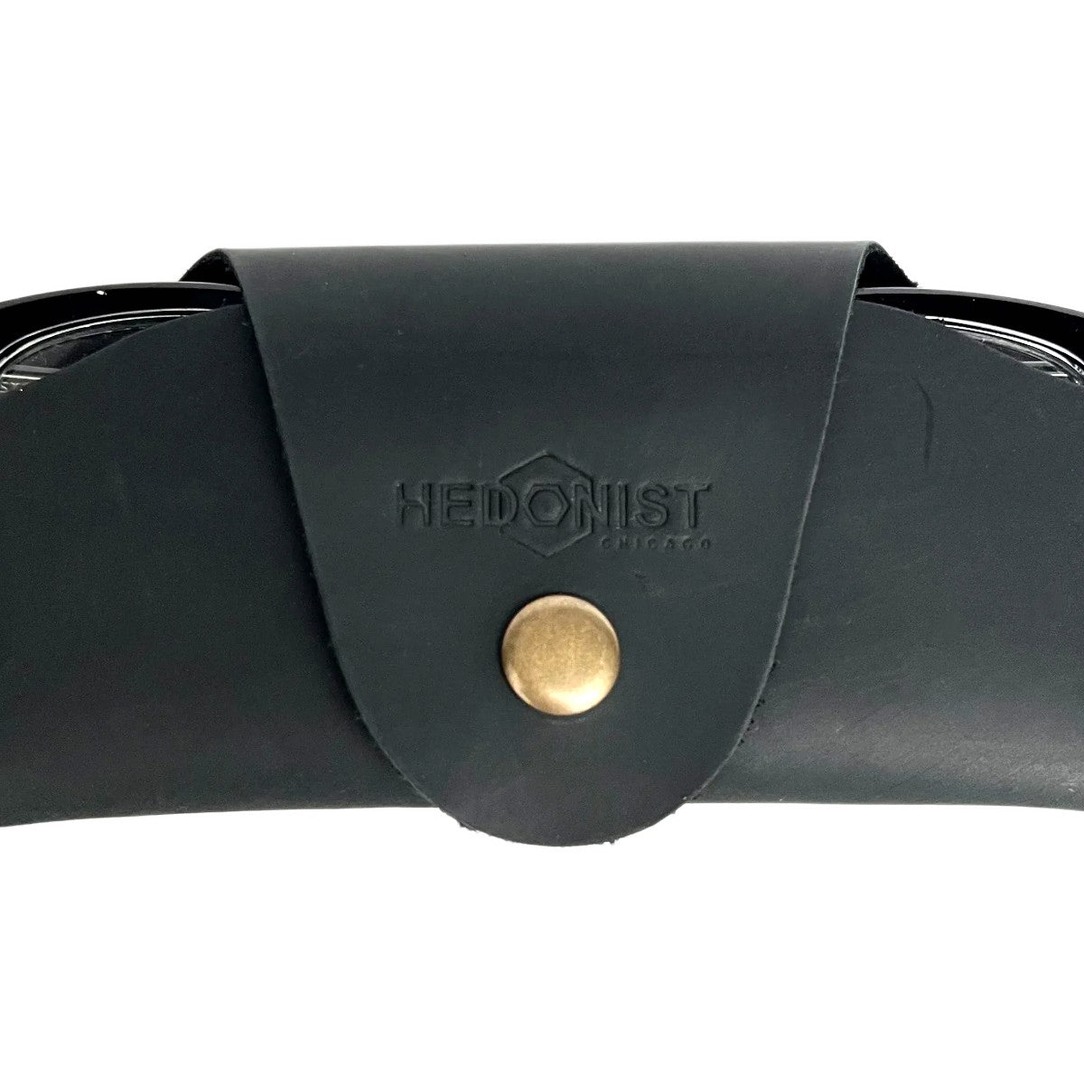 Small Soft Leather Eye Glasses Case in Black, closed, with sunglasses temples visible poking out both sides
