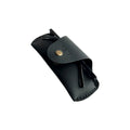 Small Soft Leather Eye Glasses Case in Black, angled view with folded sunglasses tucked inside